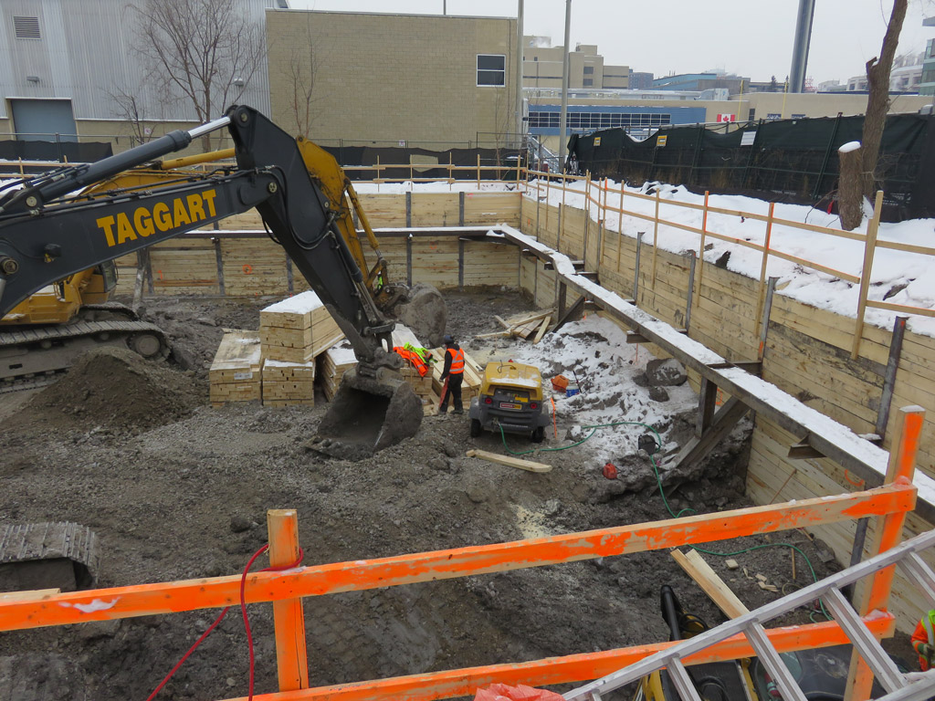 Shoring was required to facilitate the excavation for the one level of underground parking. RWH Engineering Inc. (RWH) was retained to complete the design. Soldier Piles and Lagging project by RWH Engineering